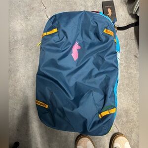 Cotopaxi Allpa 35L Travel Pack in Blue with Red Accents